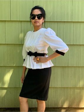 Vintage black and white structured dress with peplum and bow